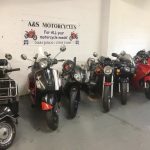 Row of motor bikes in A&S Motorcycles garage